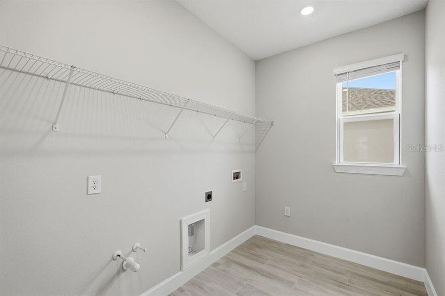 Spacious, unfurnished interior of a new home in Esplanade at Westview, Kissimmee (Image 32).