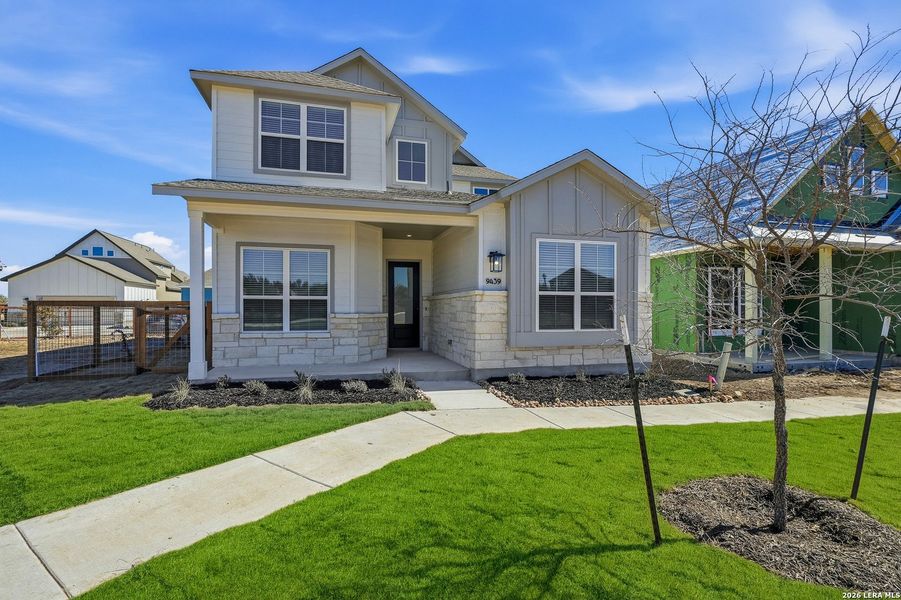 Front exterior of a new home in The Crossvine, Schertz, TX, highlighting curb appeal (Image 22).