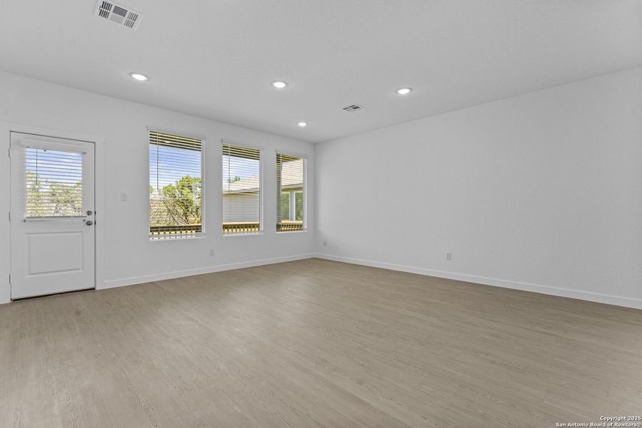 Spacious, unfurnished interior of a new home in Waterwheel: Coastline Collection, San Antonio (Image 9).