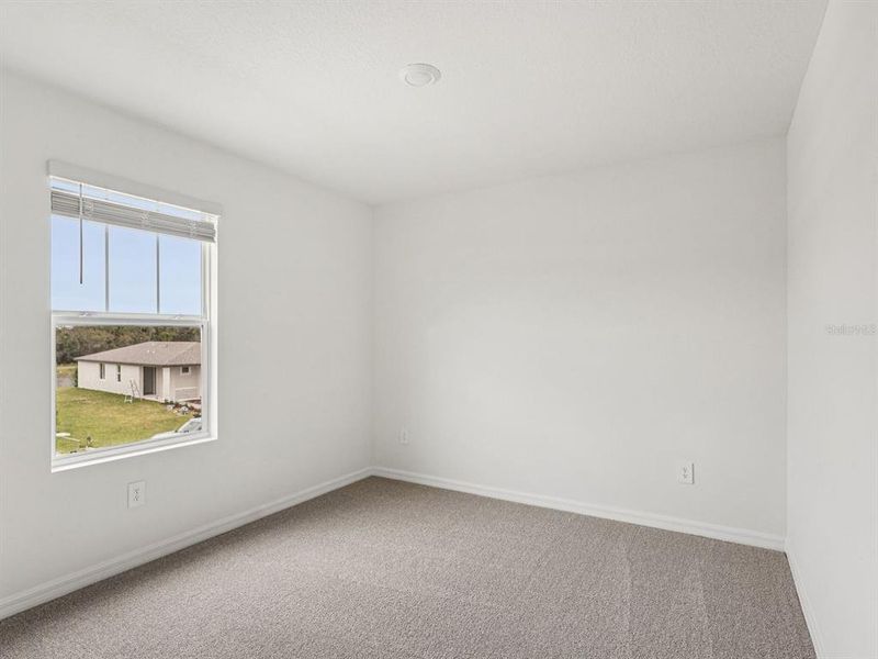 Spacious, unfurnished interior of a new home in Coasterra - Premier Series, Palmetto (Image 26).