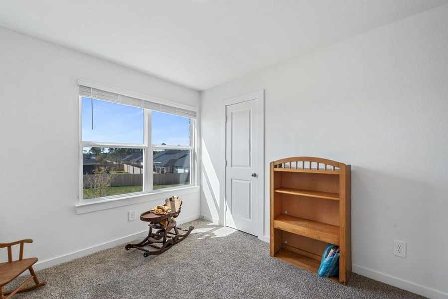Second secondary room upstairs overlooks the front and has walk in closet.