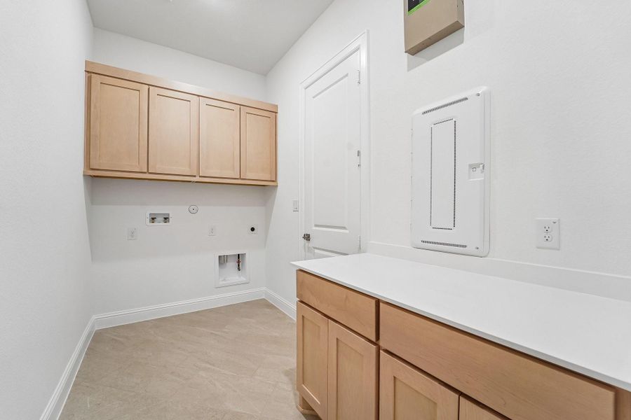 Furnished interior view inside a new home in Del Bello Lakes 60', Manvel (Image 6).