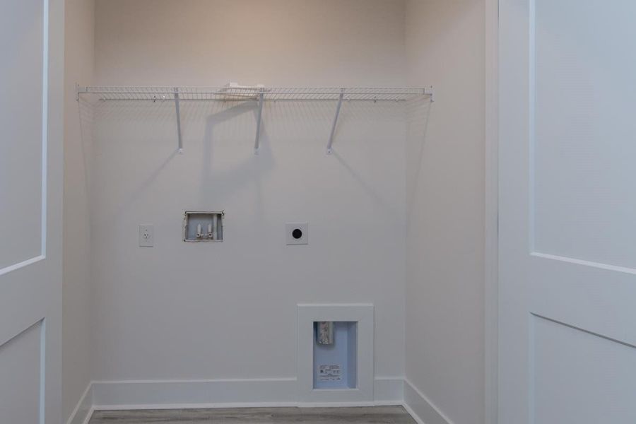 Representative unfurnished interior of a home built from the 1692 Townhome by Adams Homes in Parkstone Place Townhomes, Roebuck (Image 17).