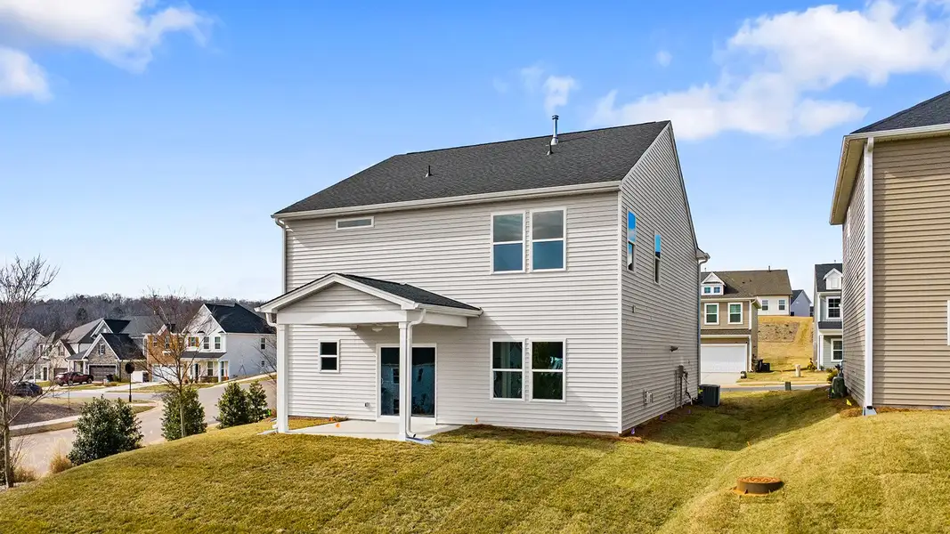 Exterior details and patio area of a home in Hanes Lake, Winston-Salem (Image 3).