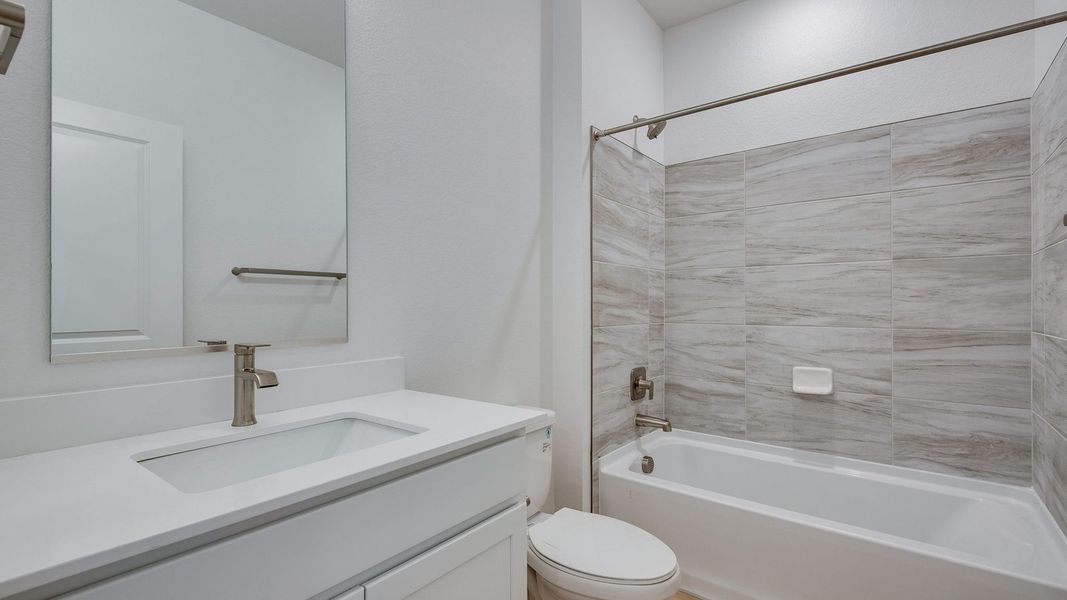 Furnished interior view inside a new home in Trails at Crowfoot, Parker (Image 12).