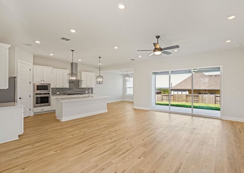 The Santos has an open floor plan that connects the kitchen, dining room and family room. The Santos has an open floor plan that connects the kitchen, dining room and family room.