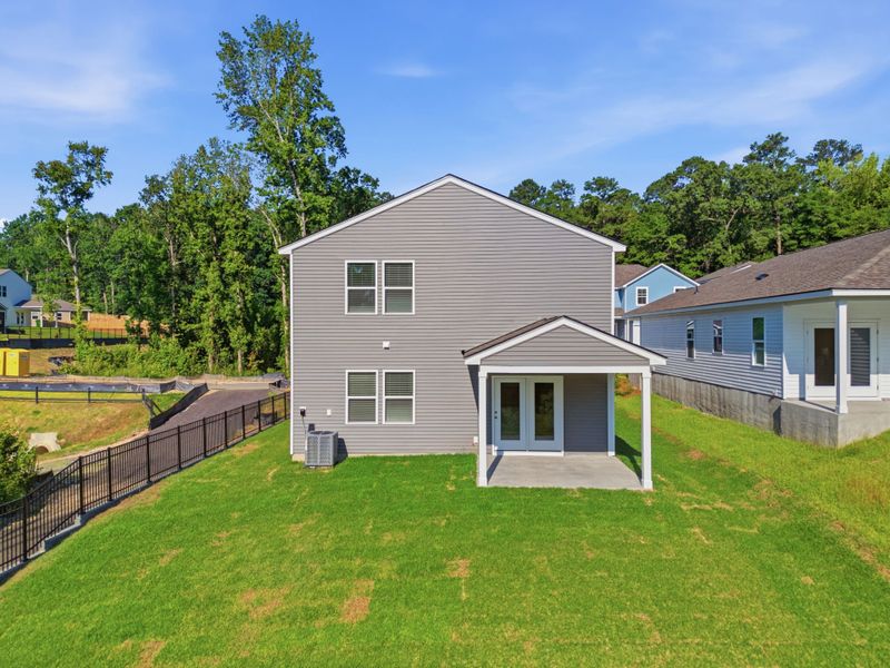 Exterior details and patio area of a home in Grand Arbor, Blythewood (Image 3).