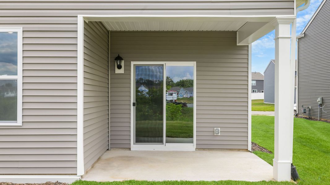 Exterior details and patio area of a home in Tap Root Farms, Fletcher (Image 3).