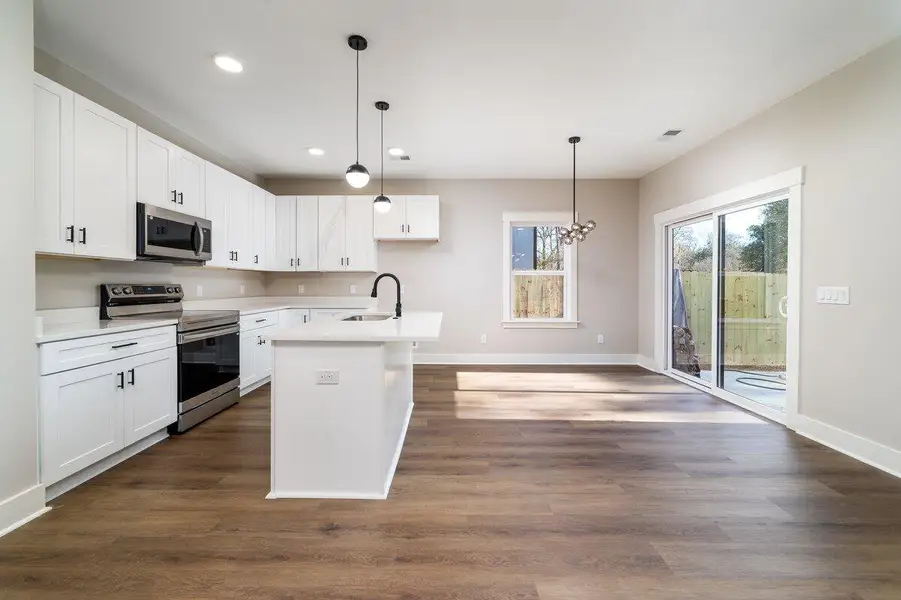 Furnished interior view inside a new home in , North Charleston (Image 6).