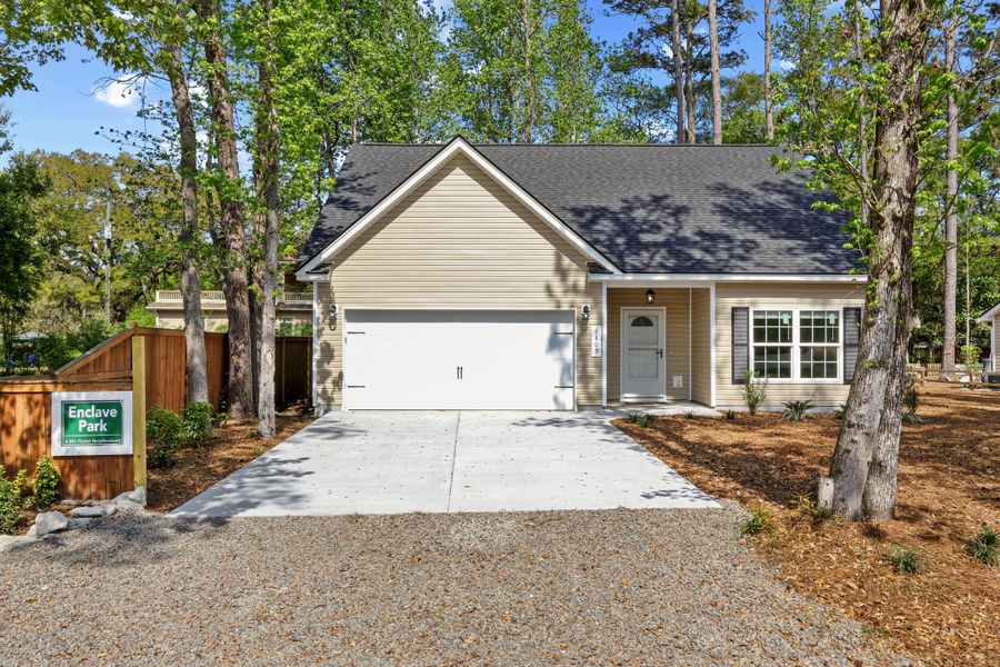 Front exterior of a new home in , Johns Island, SC, highlighting curb appeal (Image 1). Front exterior of a new home in , Johns Island, SC, highlighting curb appeal (Image 1).