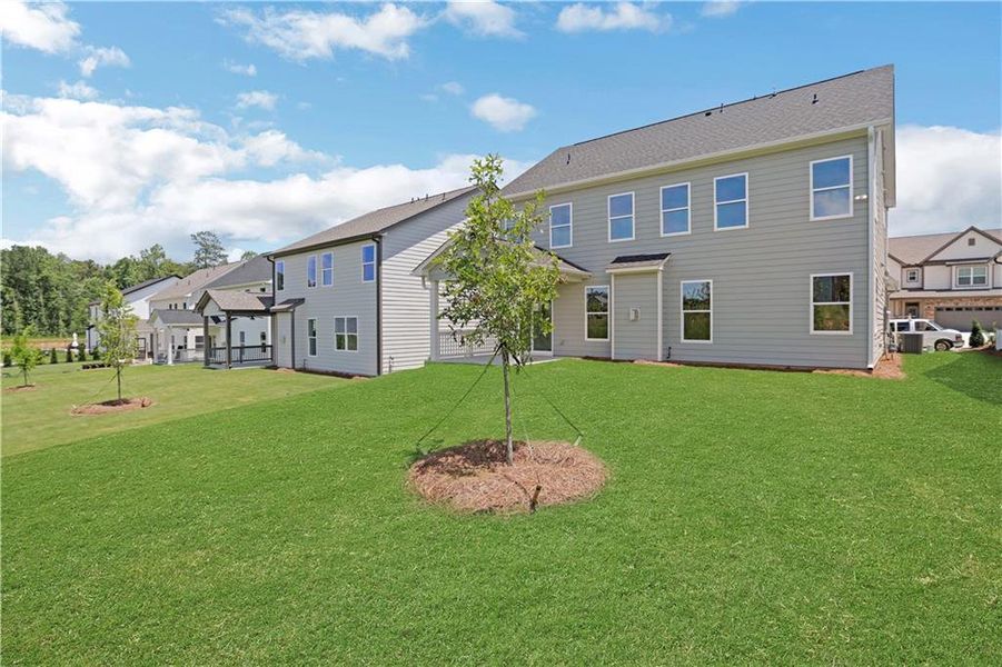 Exterior details and patio area of a home in Twin Lakes, Hoschton (Image 25).