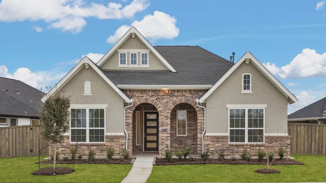 Representative exterior photo of a completed home built from the Mickelson by Chesmar Homes in Riceland Alley Loads, Mont Belvieu, TX (Image 41).