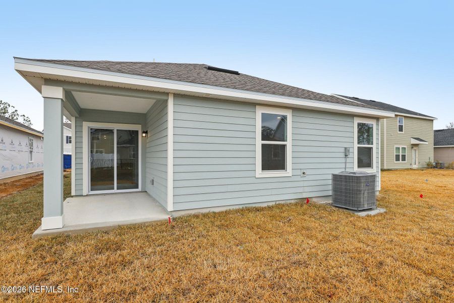 Exterior details and patio area of a home in Kings Landing, Jacksonville (Image 8).