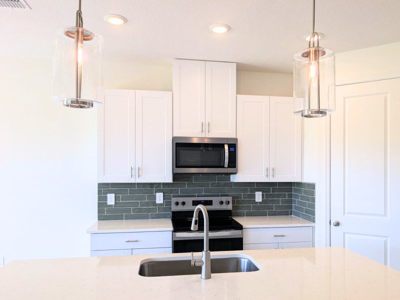 Furnished interior view inside a new home in Coasterra - Reserve Series, Palmetto (Image 7).