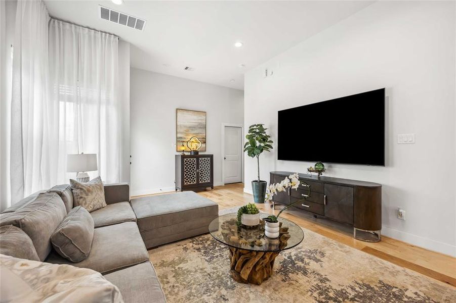 Huge open concept living area view from kitchen.