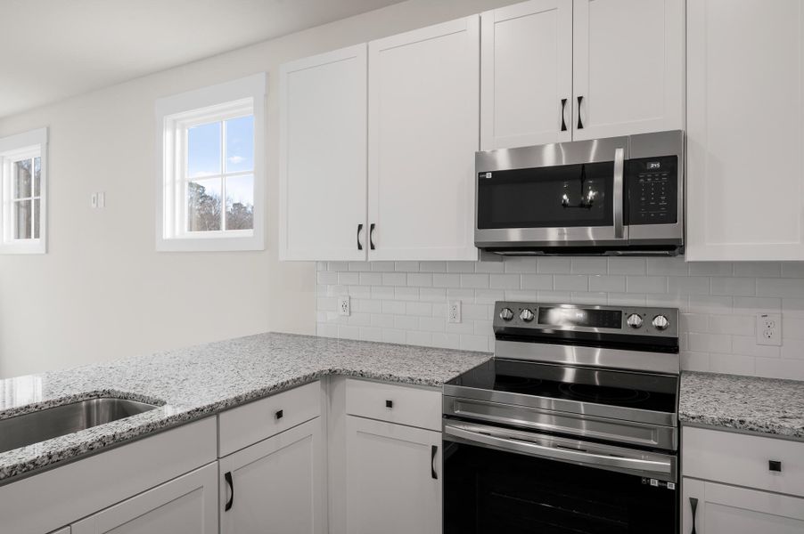 Photo is of a similar home