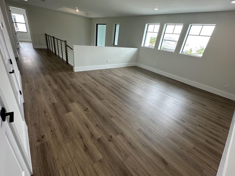Furnished interior view inside a new home in Coral Isles at Avenir, Palm Beach Gardens (Image 6).