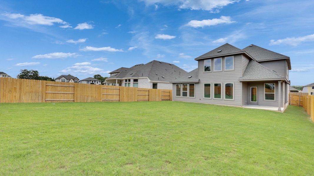 Furnished interior view inside a new home in Oaks at San Gabriel, Georgetown (Image 37).