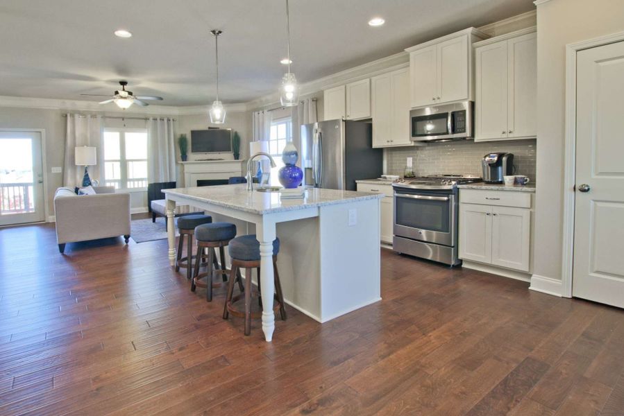Representative furnished interior of a home built from the Barwick by KM Homes in Nickel Creek at Newnan Crossing, Newnan (Image 10).