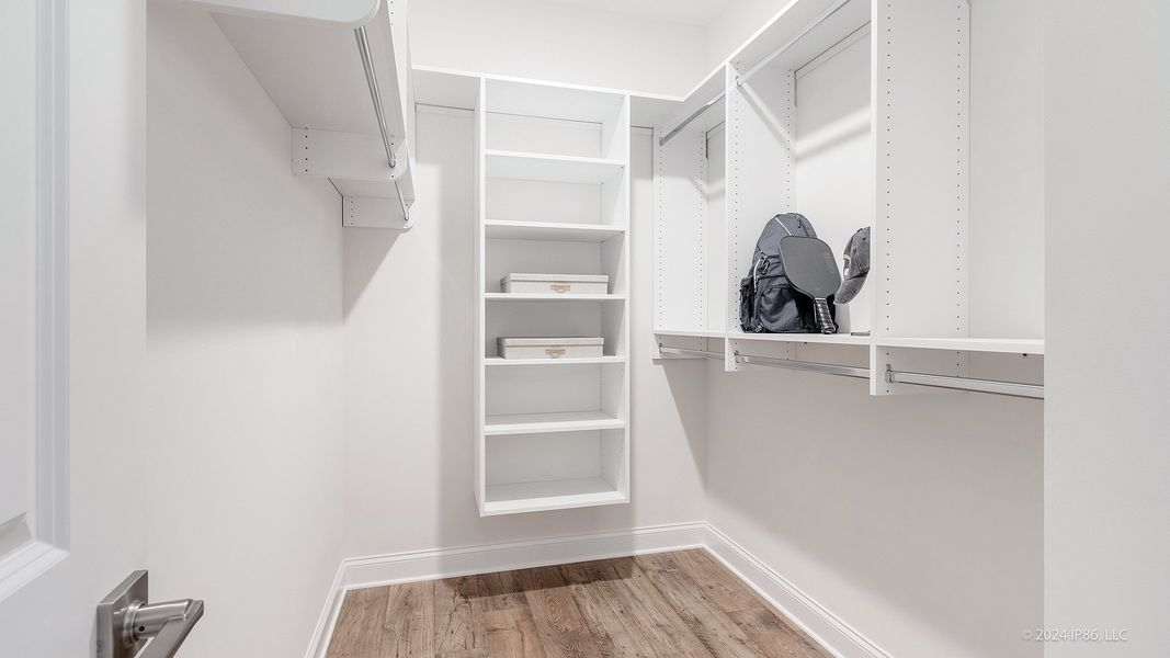 Representative unfurnished interior of a home built from the Promenade by Epcon Communities in The Courtyards at Redbud Lane, Holly Springs (Image 25).