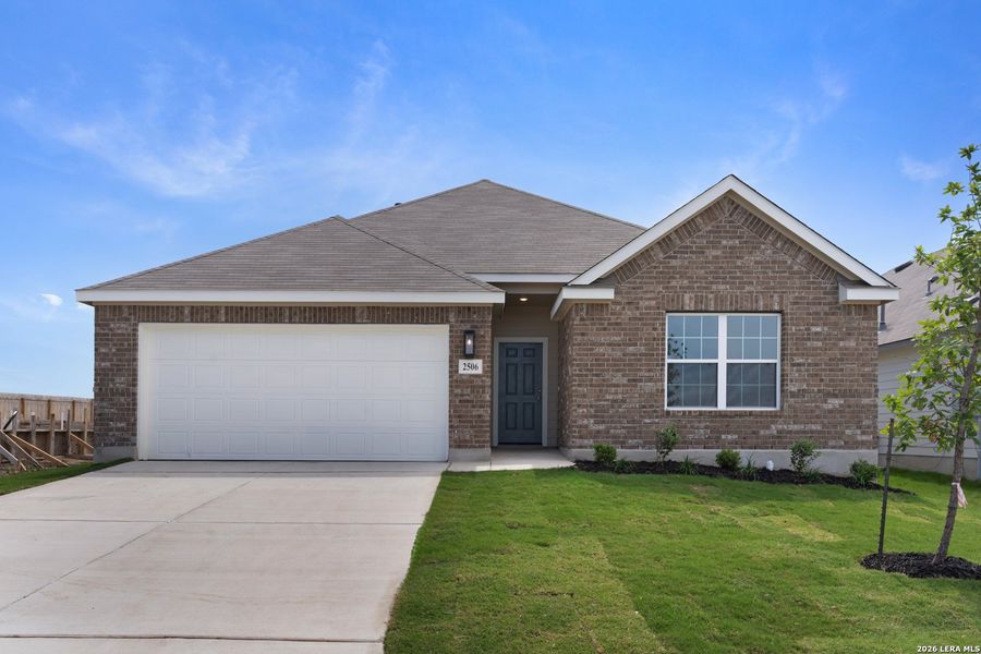 Front exterior of a new home in Prairie Green, Converse, TX, highlighting curb appeal (Image 1). Front exterior of a new home in Prairie Green, Converse, TX, highlighting curb appeal (Image 1).