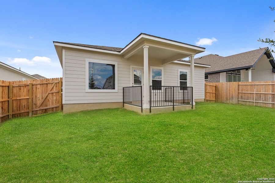 Front exterior of a new home in August Fields, New Braunfels, TX, highlighting curb appeal (Image 21).