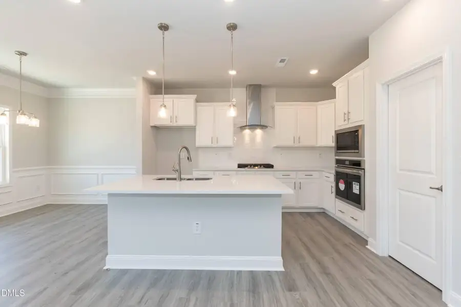 Furnished interior view inside a new home in Hidden Pines, Cameron (Image 3).