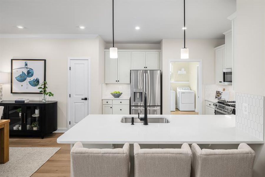 Representative furnished interior of a home built from the Griffin Hall by Ryan Homes in Newberry 55+, McDonough (Image 4).