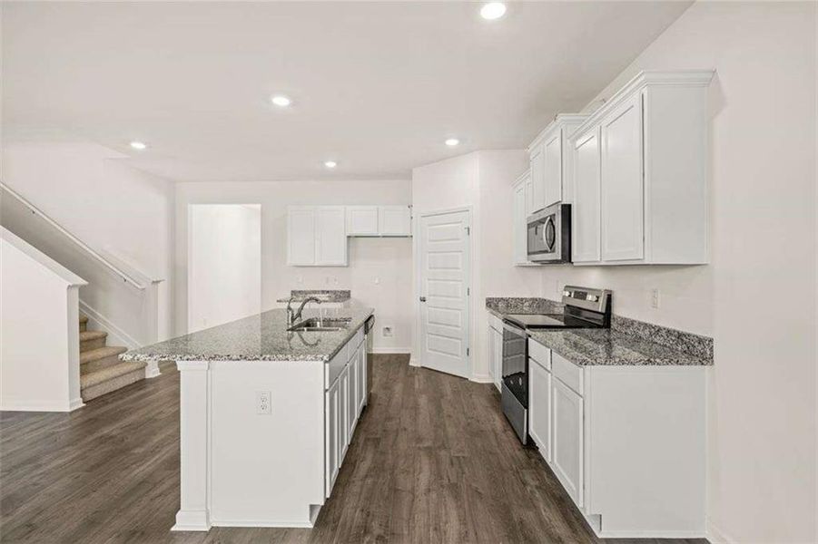 Furnished interior view inside a new home in Oakchase at Hampton, Hampton (Image 4).