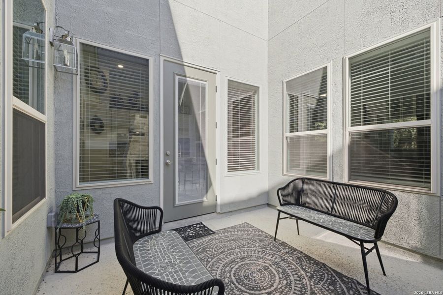Exterior details and patio area of a home in Ventana, Bulverde (Image 25).