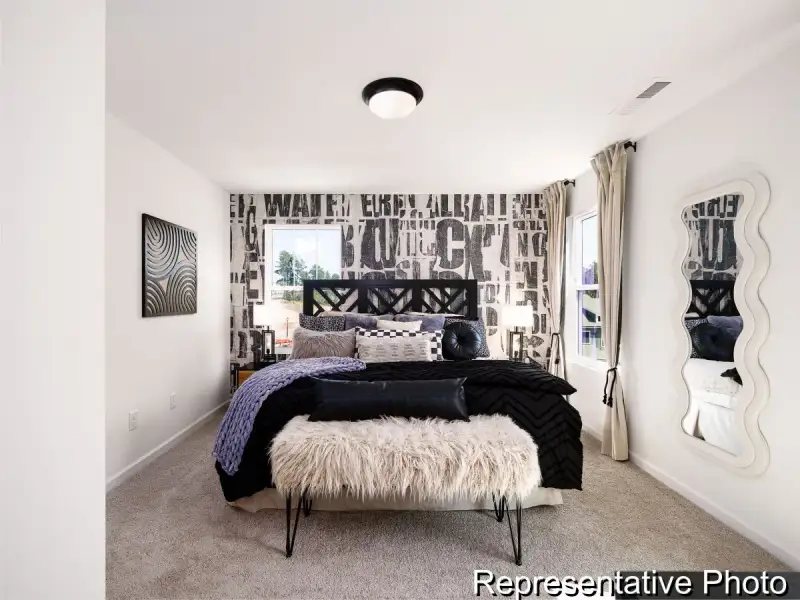 Furnished interior view inside a new home in Village at Reedy Creek Townhomes, Charlotte (Image 15).