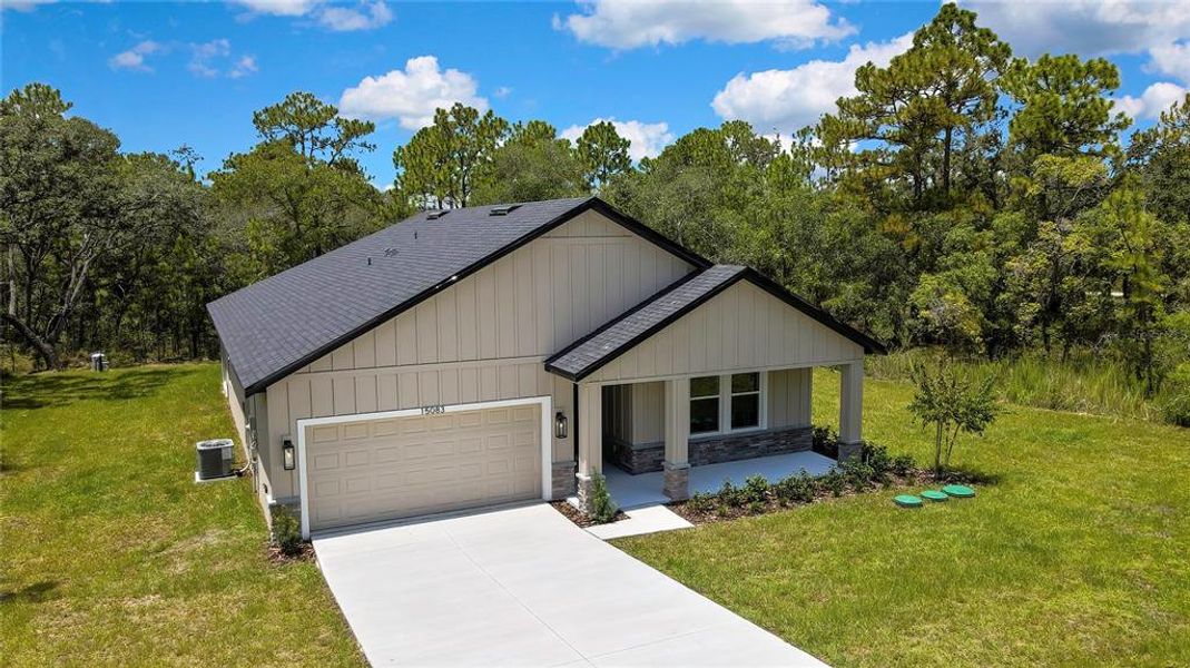 Front exterior of a new home in , Brooksville, FL, highlighting curb appeal (Image 30).
