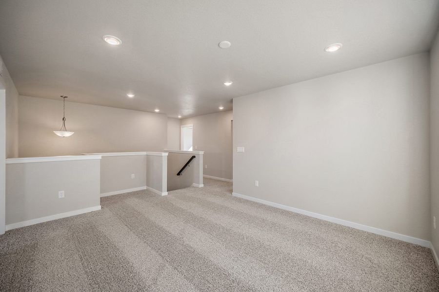 Spacious, unfurnished interior of a new home in Ridge at Lorson Ranch, Colorado Springs (Image 29).
