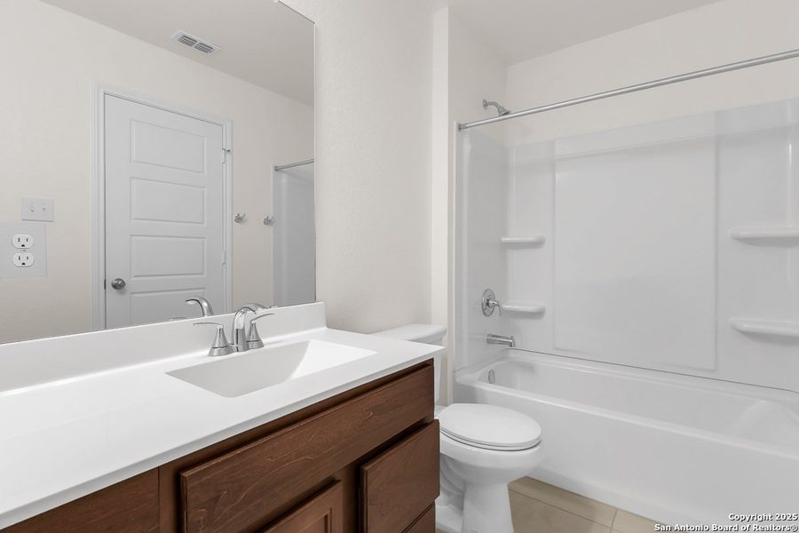 Furnished interior view inside a new home in Southton Cove, Elmendorf (Image 7).