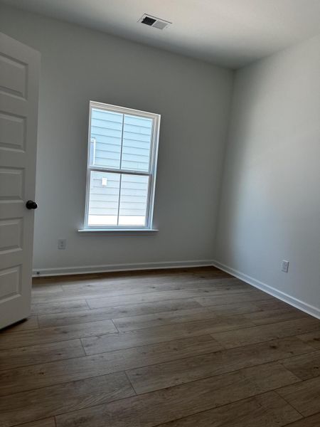 Spacious, unfurnished interior of a new home in Horizons at Carnes Crossroads | 55+: Legends Collection, Summerville (Image 20). Spacious, unfurnished interior of a new home in Horizons at Carnes Crossroads | 55+: Legends Collection, Summerville (Image 20).