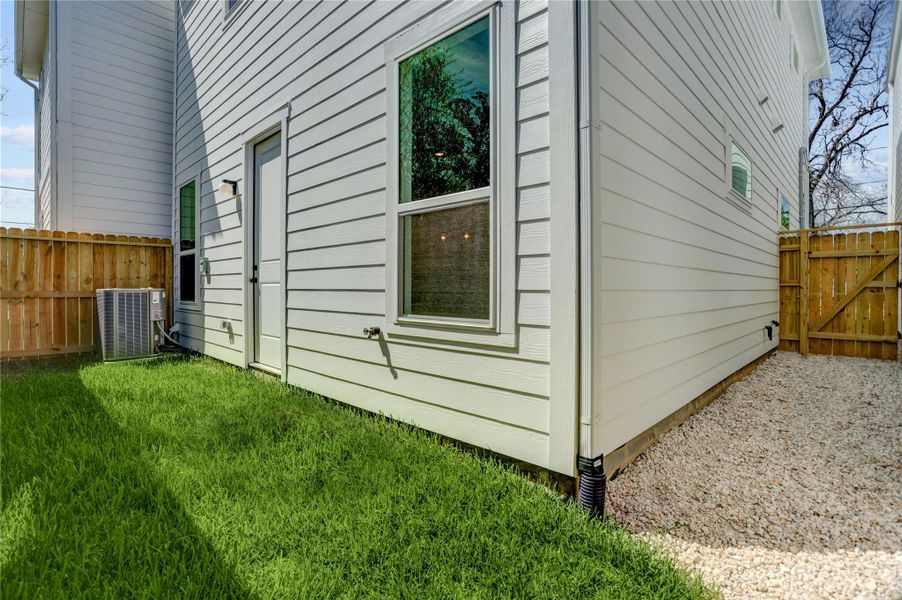 The home has a fully fenced low maintenance green space and gravel side yard.