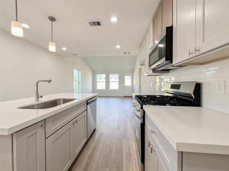 Furnished interior view inside a new home in , Conroe (Image 12).