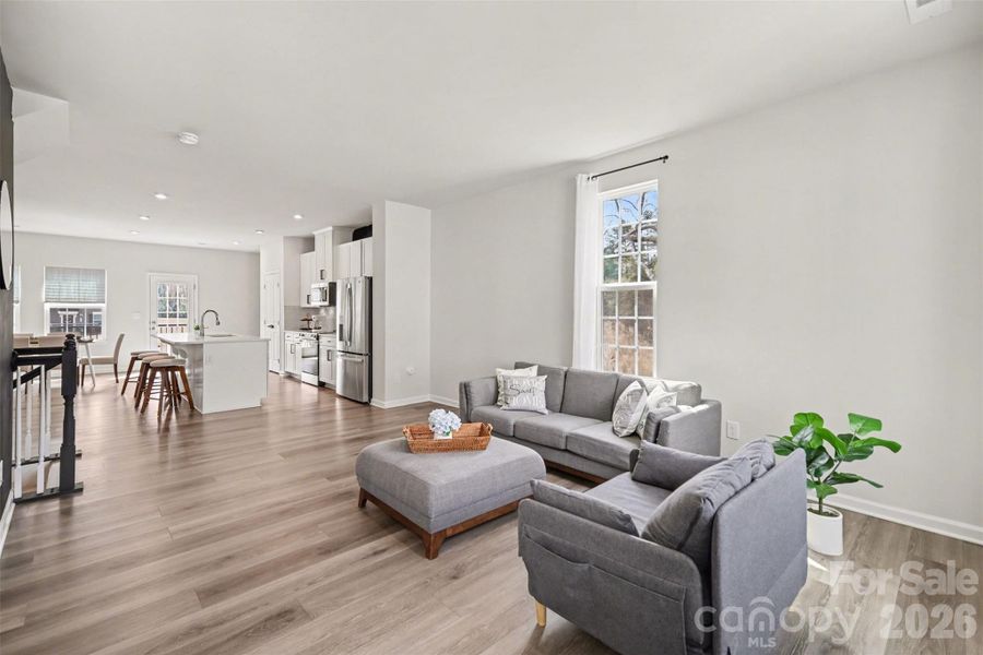 Living area with wide plank flooring