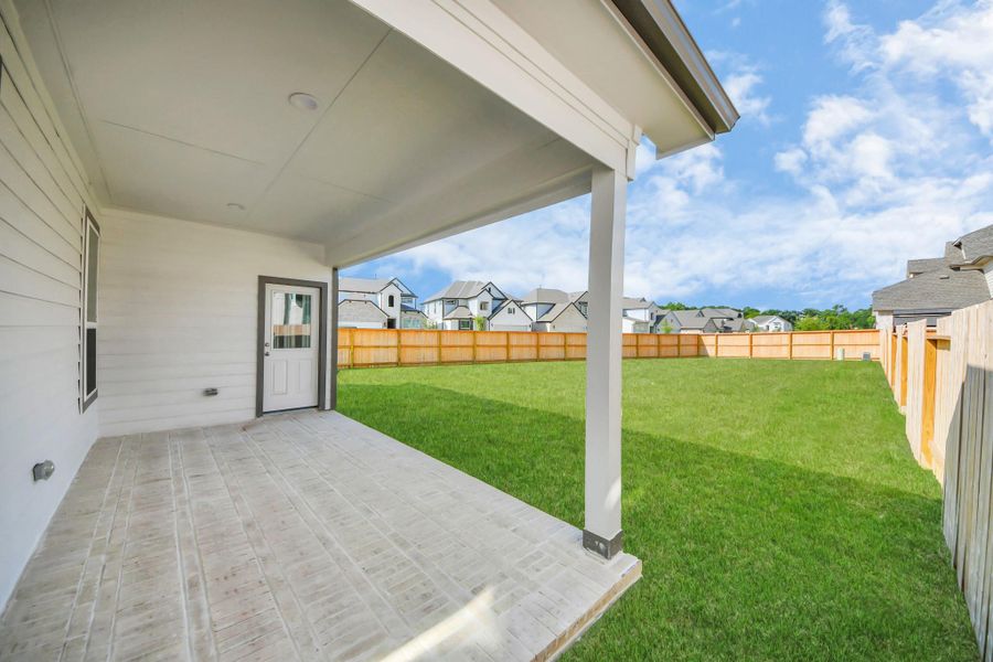 Experience outdoor living at its finest on this expansive covered patio, thoughtfully designed for BBQs and delightful outdoor dining. Experience outdoor living at its finest on this expansive covered patio, thoughtfully designed for BBQs and delightful outdoor dining.