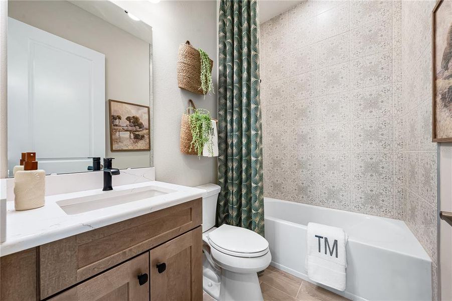 Furnished interior view inside a new home in Esplanade at Skye Ranch, Sarasota (Image 31).