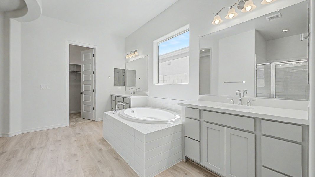 Representative furnished interior of a home built from the Montoro by DRB Homes in Windrose, Waddell (Image 13).