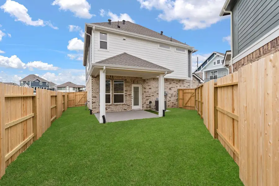 Exterior details and patio area of a home in Elyson, Katy (Image 4). Exterior details and patio area of a home in Elyson, Katy (Image 4).