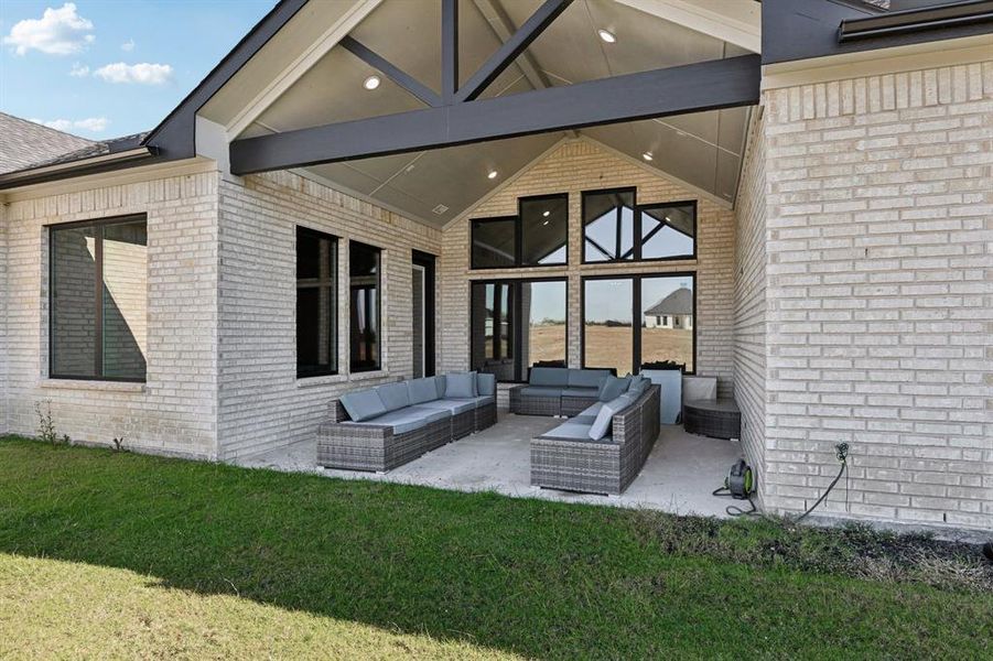 View of patio / terrace with an outdoor living space View of patio / terrace with an outdoor living space