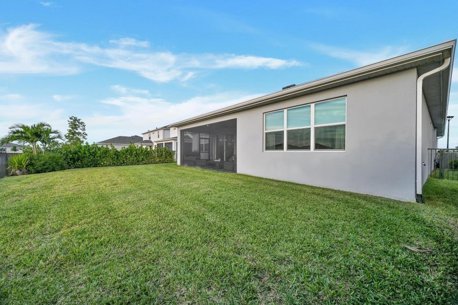 Exterior details and patio area of a home in Tradition - Cadence, Port St. Lucie (Image 33).