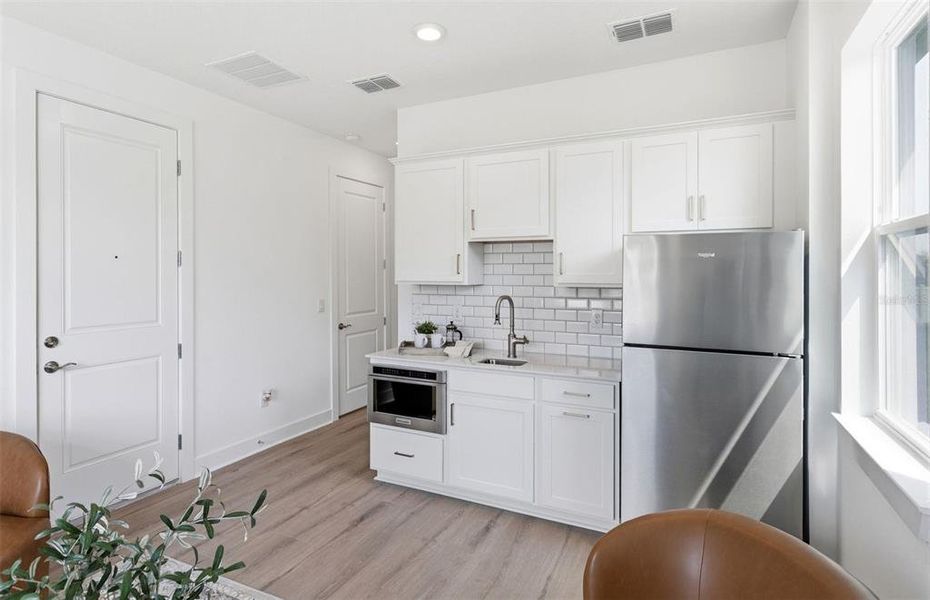 Furnished interior view inside a new home in Riverwood, Zephyrhills (Image 9).