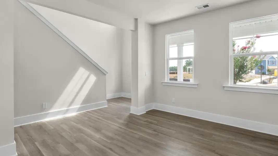Representative unfurnished interior of a home built from the Forrester by D.R. Horton in The Highlands at Cedar Hill Landing, Navassa (Image 16).