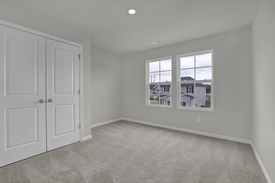 Spacious, unfurnished interior of a new home in River Tide Farms, Bolivia (Image 25).