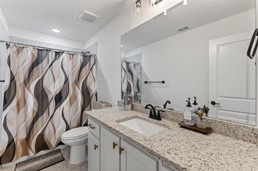 Furnished interior view inside a new home in , Little Elm (Image 30).