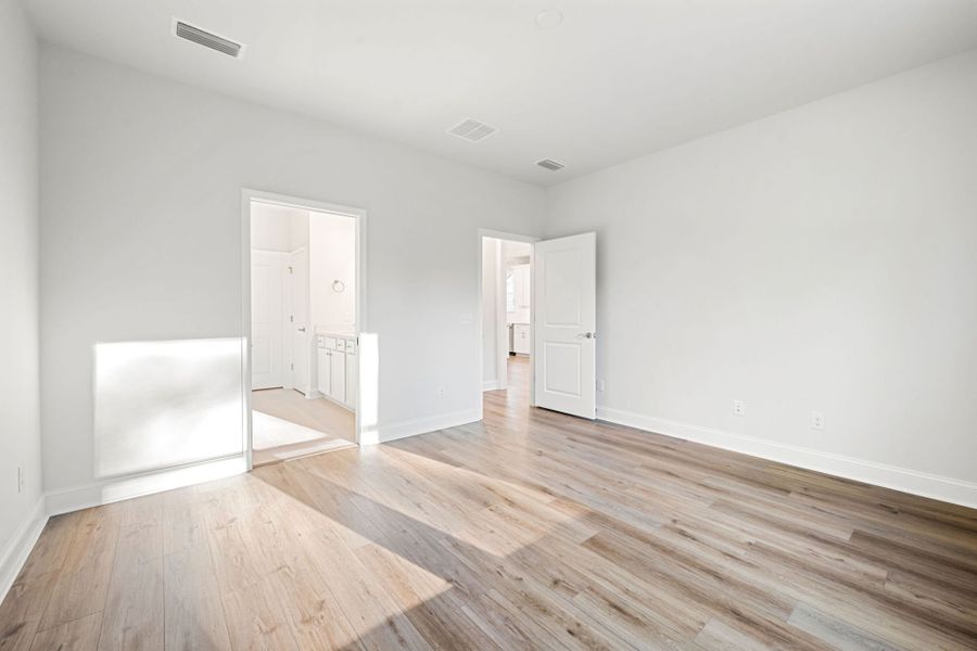 Spacious, unfurnished interior of a new home in Sun City Hilton Head, Bluffton (Image 23).