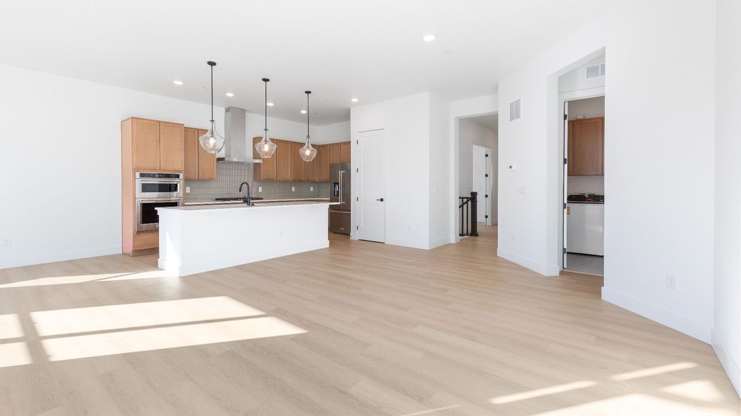 Furnished interior view inside a new home in Dillon Pointe - Journey, Broomfield (Image 12).